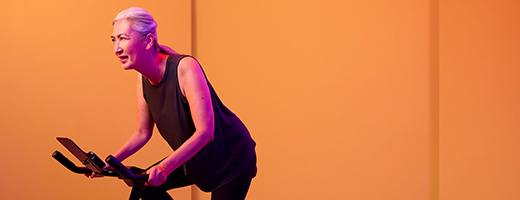 Image of woman on an exercise bike